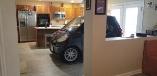 Hurricane Prep: Florida Man Parks Smart Car in Kitchen