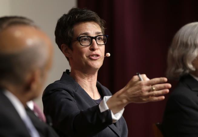 One America News Takes Maddow to Court Over 'Russian Propaganda' Claim