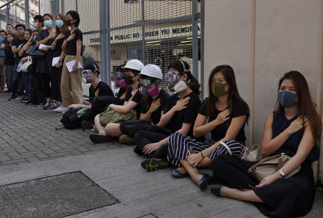 Hong Kong Plans to Outlaw Masks