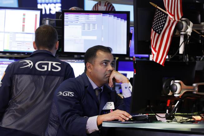 US Stocks Edge Down
