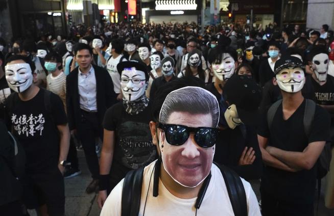 Hong Kongers Defy Mask Ban on Halloween