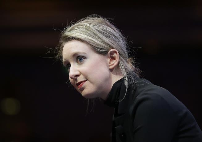 Due in Two Courtrooms, ex-CEO of Theranos Calls In to One