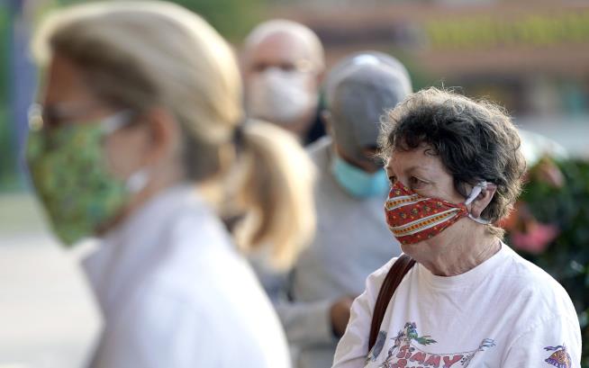 After Threats, City Kills Face Mask Rule