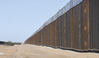 Trump Wants Border Wall Painted Black. That'll Be Pricey