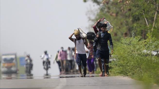 Train Kills 15 Migrant Workers Walking Home in India