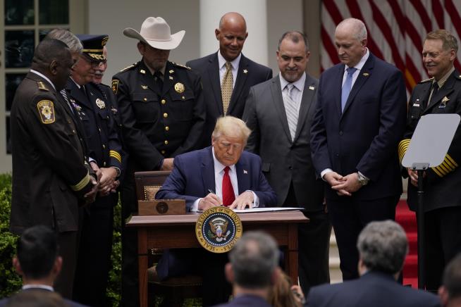 Trump Signs Executive Order on Police Reform
