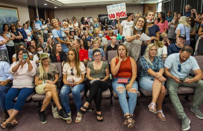 Anti-Mask Crowd Packs Utah Hearing on Masks