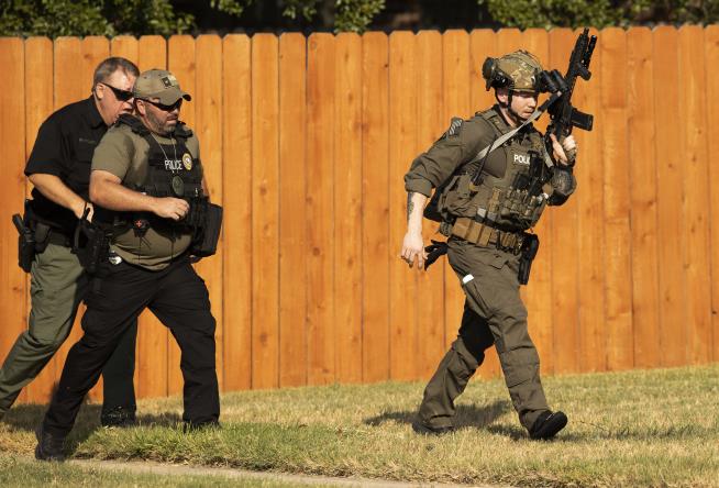 Man Barricaded in Home After Allegedly Shooting 3 Cops
