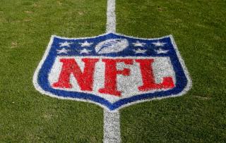 77 Apparently False Positives Among NFL Virus Tests