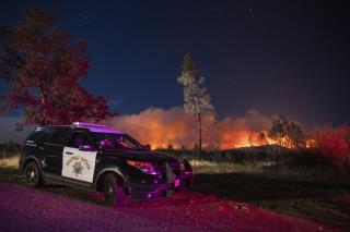 Winds Push Wildfires Through Wine Country. Thousands Flee