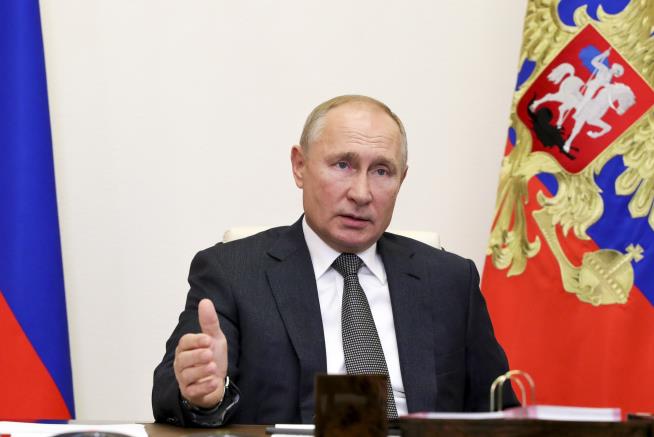 From His 'Cocoon,' Putin Tells Russia to Return to Normal