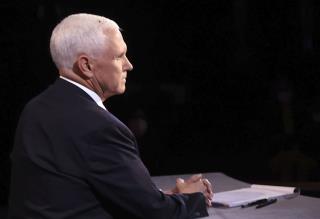 VP Debate Has Unexpected Guest, on Pence's Head