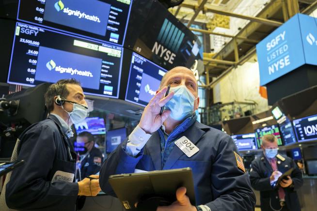 Markets Flat, Putting Brakes on February Rally