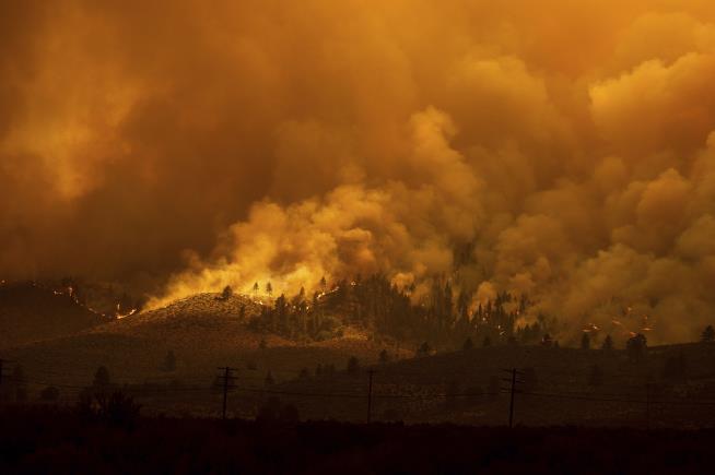 Wildfires Rage as West Bakes
