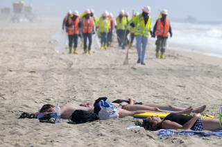 Huntington Beach Reopens After Oil Spill