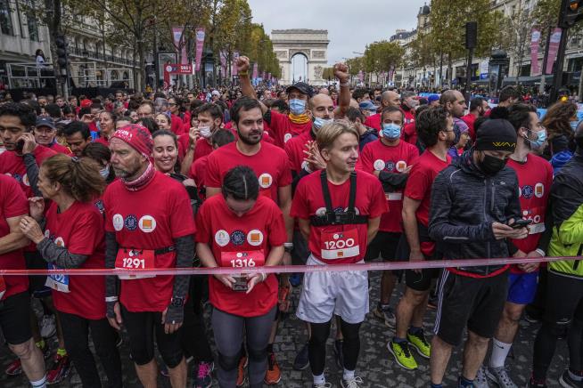 Olympic Champ Joins Thousands in Paris Run
