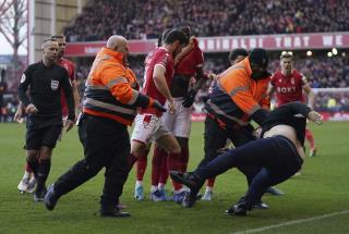 Fan Arrested After Rushing Pitch to Stop Celebration