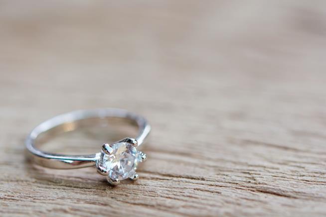 Diver Retrieves Woman's Lost Diamond Ring From River