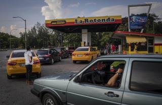 Drivers Sleep in Trucks Waiting for Fuel in Cuba