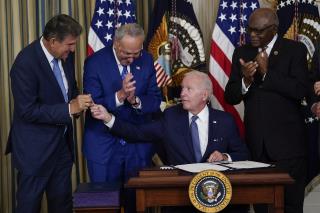 Biden Signs Climate, Health Bill Into Law