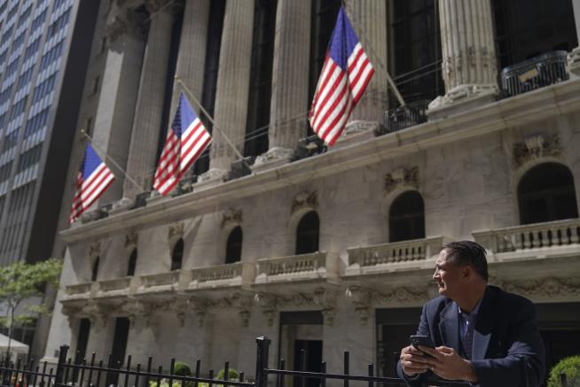 Late Slide Sends Wall Street Lower