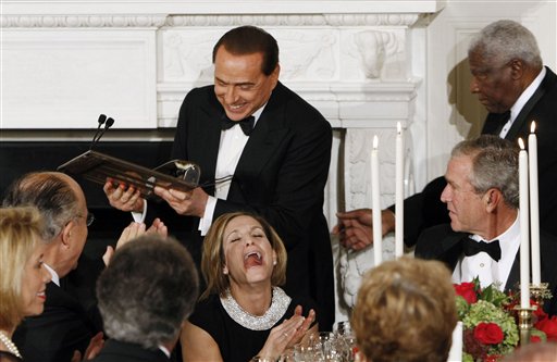 Berlusconi Breaks Podium at Rowdy White House Soiree