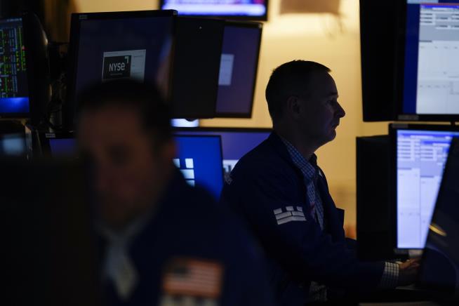 Stocks Slide After Surprisingly Strong Economic Report