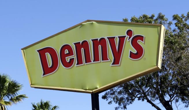 Woman Killed When Winds Topple 1.3-Ton Denny's Sign