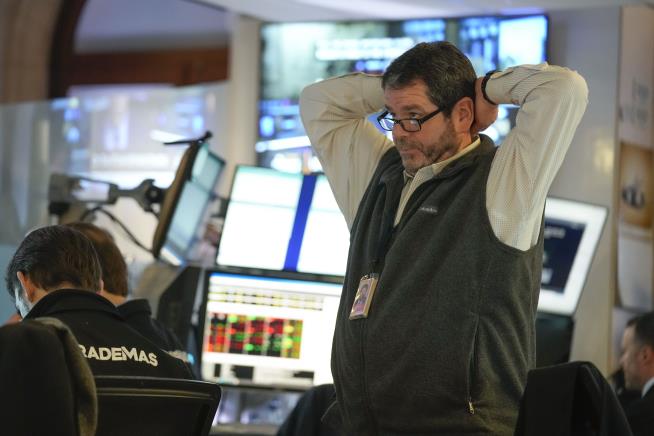 Wall Street Rises as Reports Lift Mood