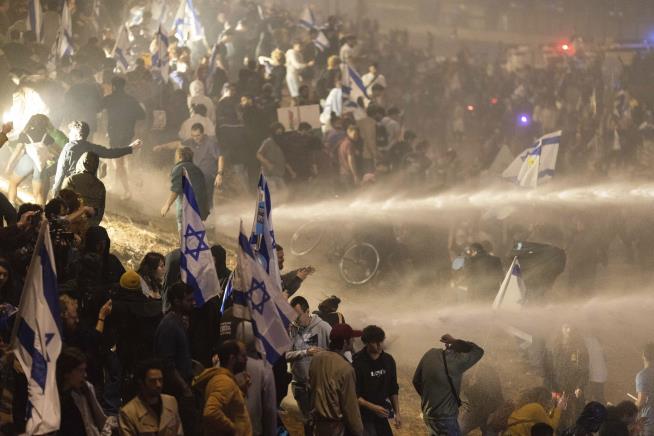 Tens of Thousands Take to the Streets as Opposition to Netanyahu's Plan Mounts