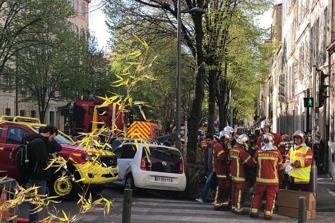 French Crews Battle Fire in Search for Trapped Victims