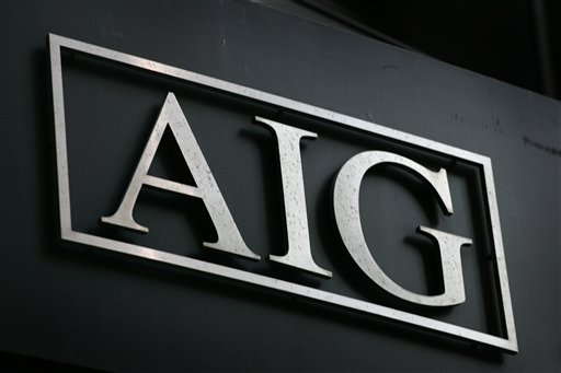 AIG Agrees to Freeze Executive Bonuses