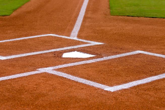 In Middle of College Baseball Game, Player Hit by Stray Bullet