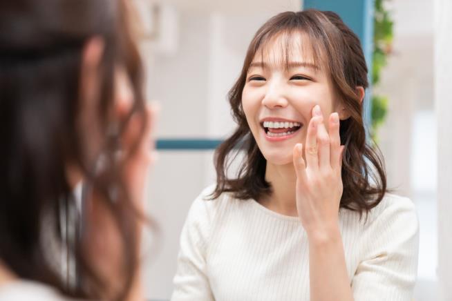 As Japan Drops Masks, Smile Coaching Booms