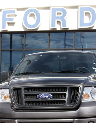 Ford Loses $2.98B, Cuts Jobs