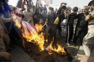 10,000 Iraqis Protest Troop Deal