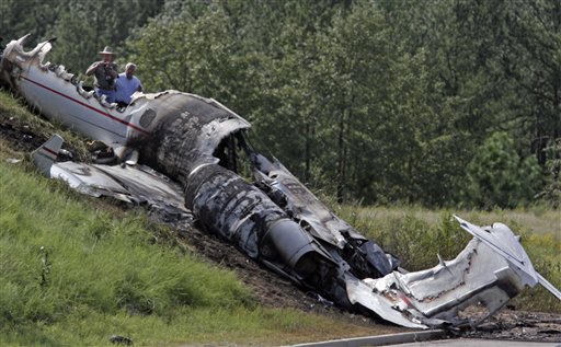 Barker Blames Pilots, Tires for Plane Crash