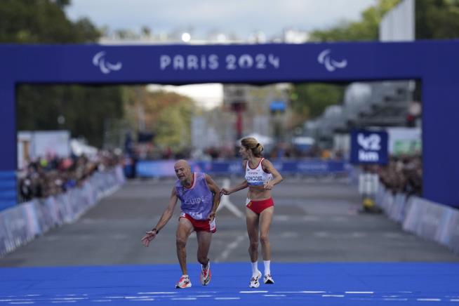 Visually-Impaired Runner Loses Medal Over Guide's Stumble