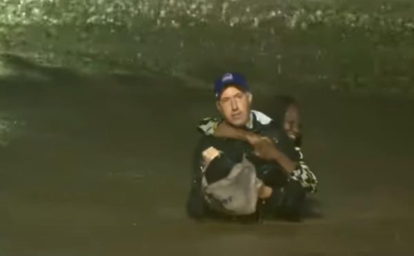 Meteorologist Interrupts Report to Rescue Woman