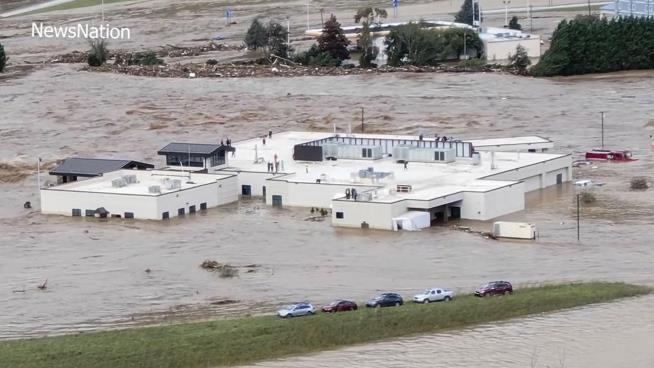 Helicopters Battling Winds Reach Patients on Hospital Roof