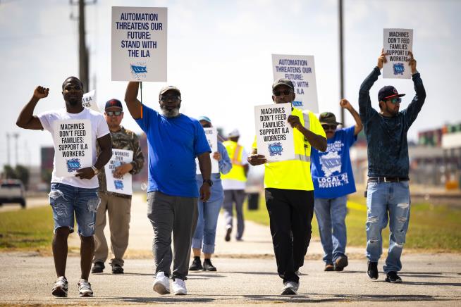 Tentative Pay Agreement Pauses Dockworkers' Strike