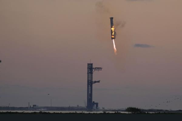 SpaceX Catches Returning Booster With 'Chopsticks'