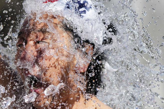 Tokyo Shrine Hosts Icy Ritual for New Year Blessings