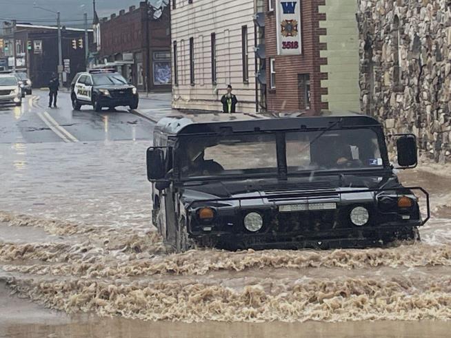 Body in Floodwaters Believed to Be 12-Year-OId