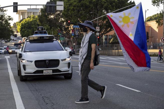 Protesting Residents Resort to 'Stacking the Waymos'