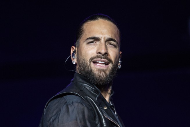 Rapper Halts Show to Scold Mom With Baby