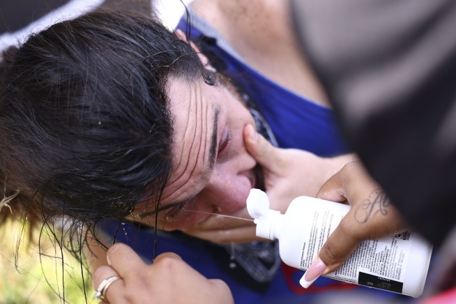 Tear Gas Deployed as ICE Protest Erupts at Chicago Site