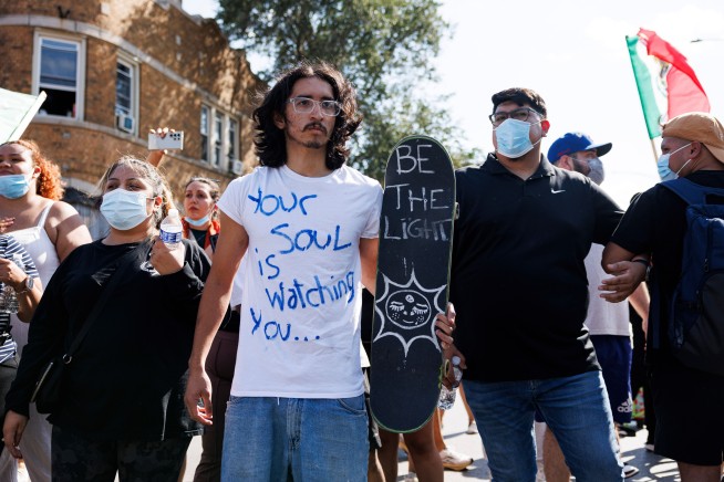 After Agents Shoot Woman, Pritzker, Noem Argue 'War Zone'