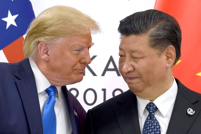 Bristling at China's Move, Trump Announces 100% Tariff