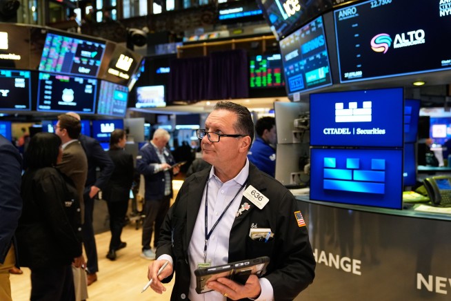 Dow Jumps 559 Points to New All-Time High